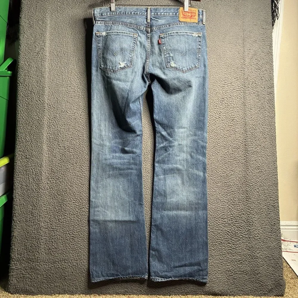 Levis Jeans Mens 36x34 Blue Denim 527 Low Boot Cut Medium Wash Flare Thrashed